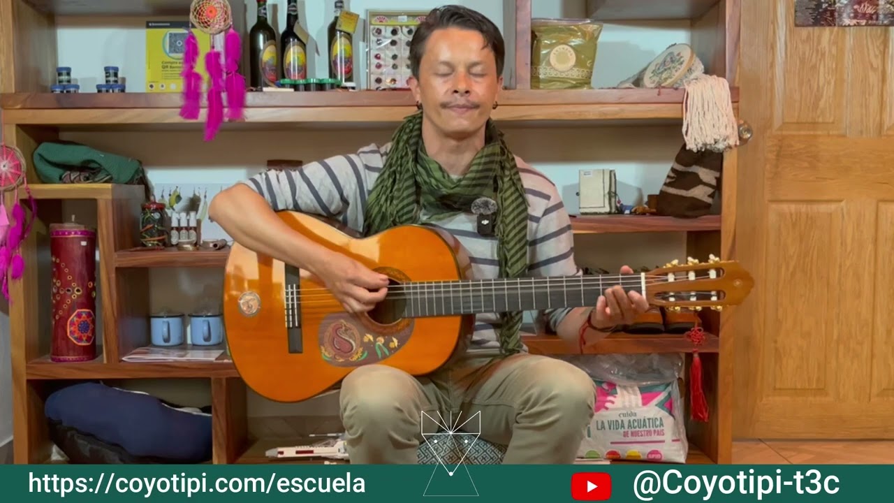 Imix Uac tocando la guitarra
